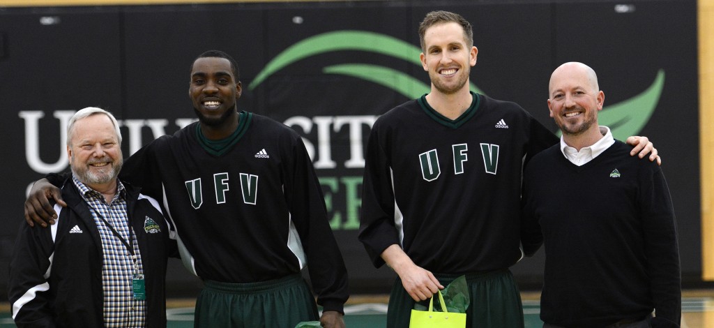 UFV president Mark Evered (left) and Cascades interim athletic director Chris Bertram (right) were on hand to honour graduating seniors Kadeem Willis and Jasper Moedt prior to their final regular season home game.