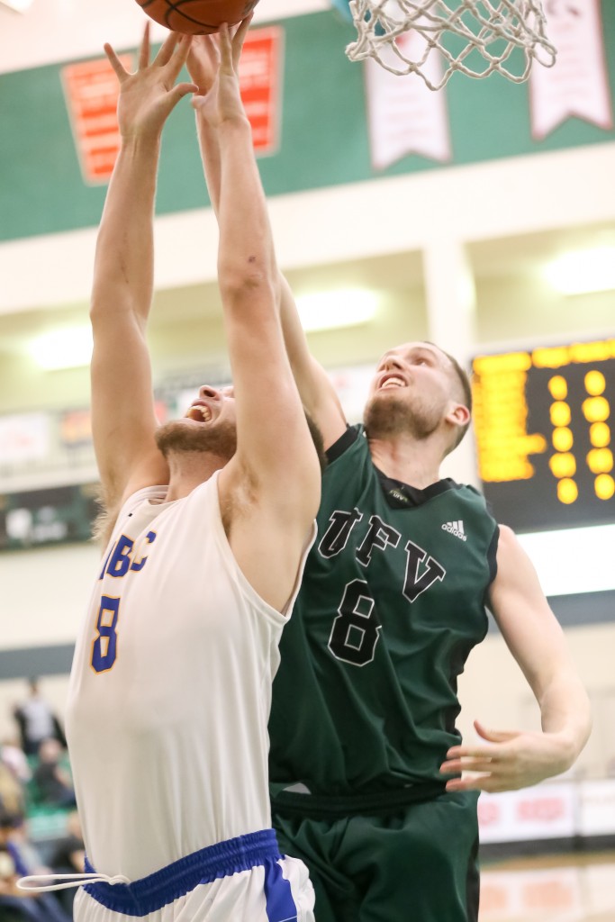 Jasper Moedt battles UBC's David Wagner for a rebound. (Josh Schaefer Photography)