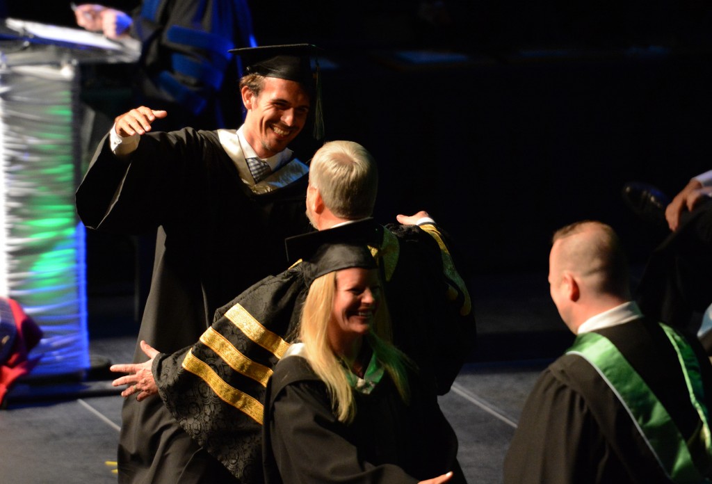 Dalibor Plavsic (MSOC) goes for a hug with UFV president Dr. Mark Evered.