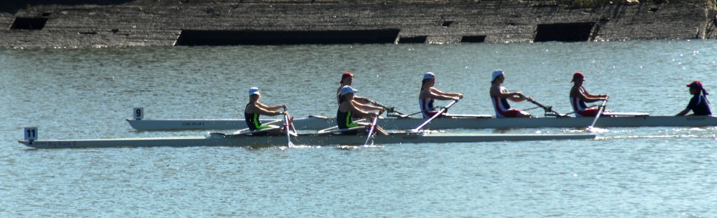 The UFV lightweight 2x women's crew of Adren Holmes and Emily Klootwyk passes the SFU women's four during the Head of the Reach regatta.