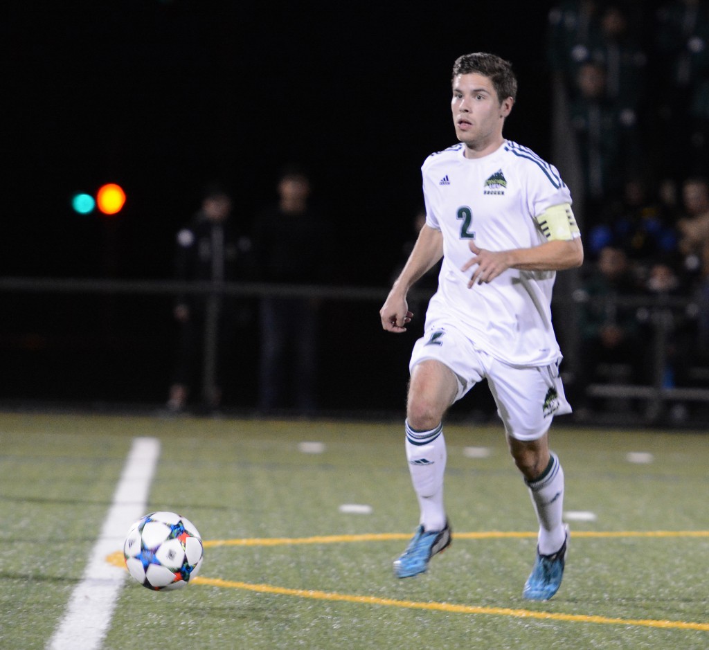 Cascades captain Colton O'Neill pushes the ball up the pitch.