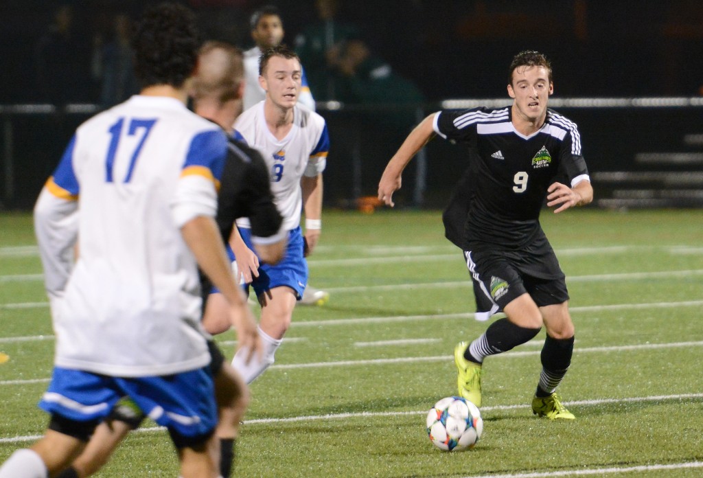 UFV striker Daniel Davidson chases down a loose ball during Saturday's clash with UVic.