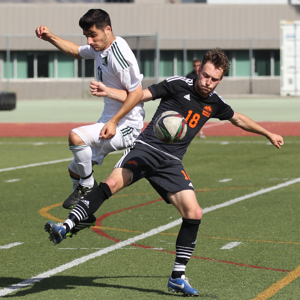 UFV's Michael Mobilio battles with TRU's Keenan Wallace during Sunday afternoon's game in Kamloops.