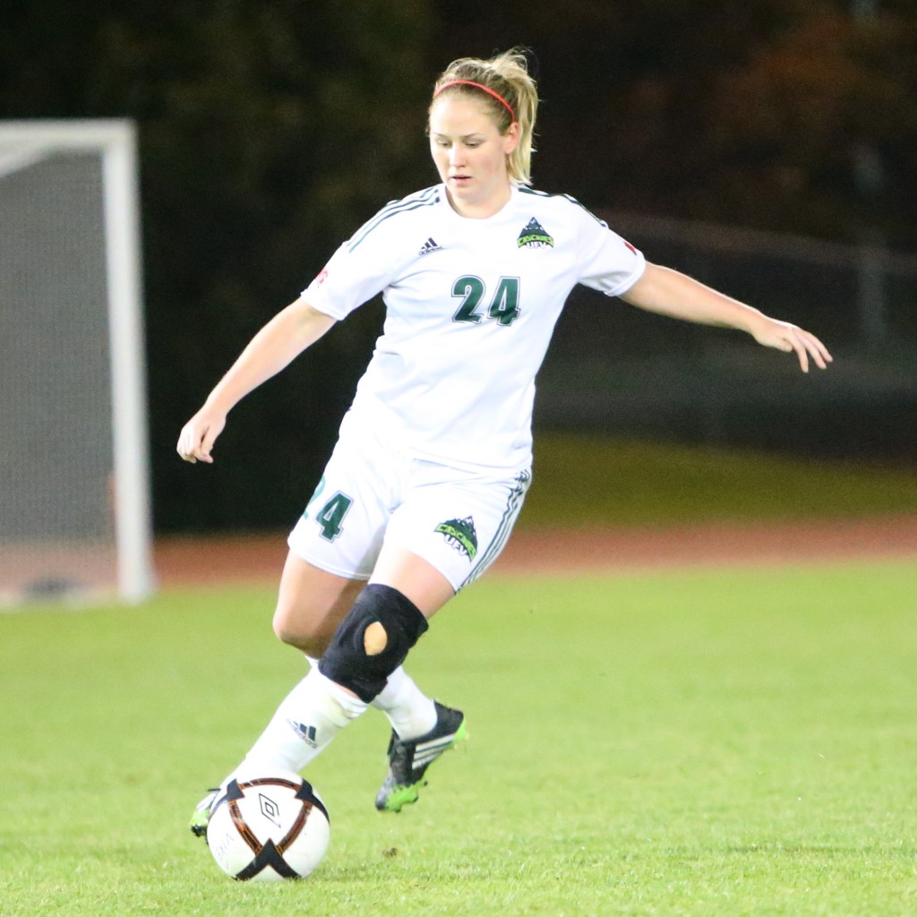 Cascades centre back Dayle Jeras clears the ball out of harm's way. (APShutter.com photo)