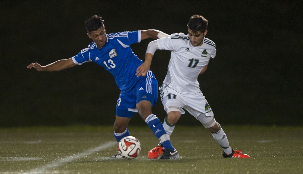 UFV midfielder Michael Mobilio battles for possession with UBC's Kerman Pannu. (Rich Lam / UBC Thunderbirds)