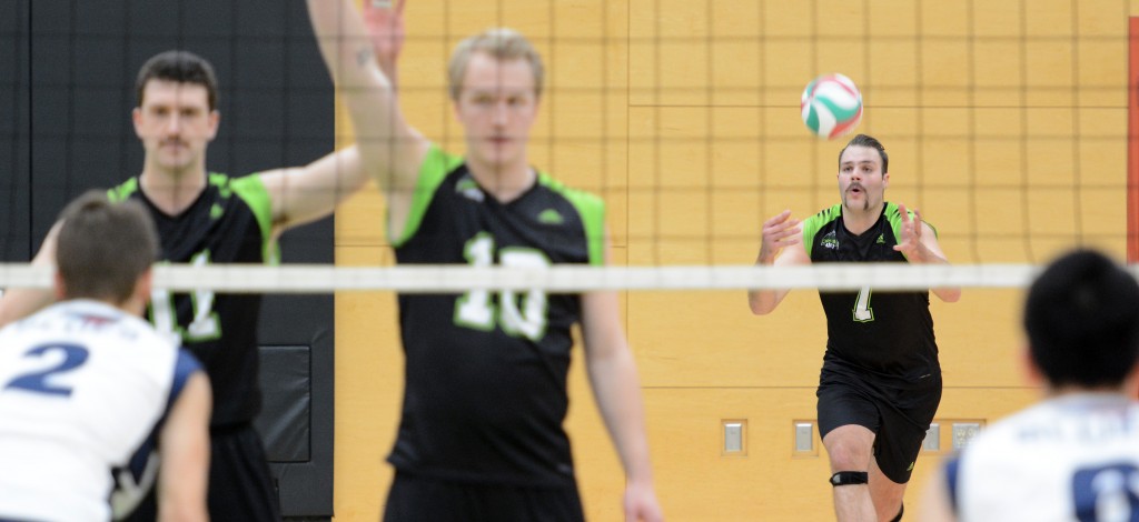 Dayton Pagliericci (No. 7, serving) played a key role in the Cascades' four-set win over Capilano on Saturday.