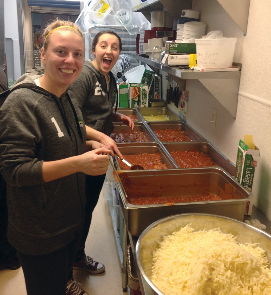 Goalkeepers Kayla Klim (left) and Risa Venuto had fun preparing the meal.