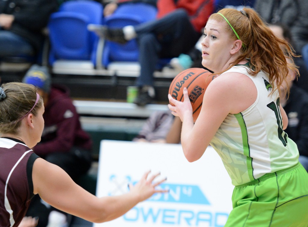 Taylor Claggett (right) is having an outstanding rookie season with the Cascades women's basketball team.