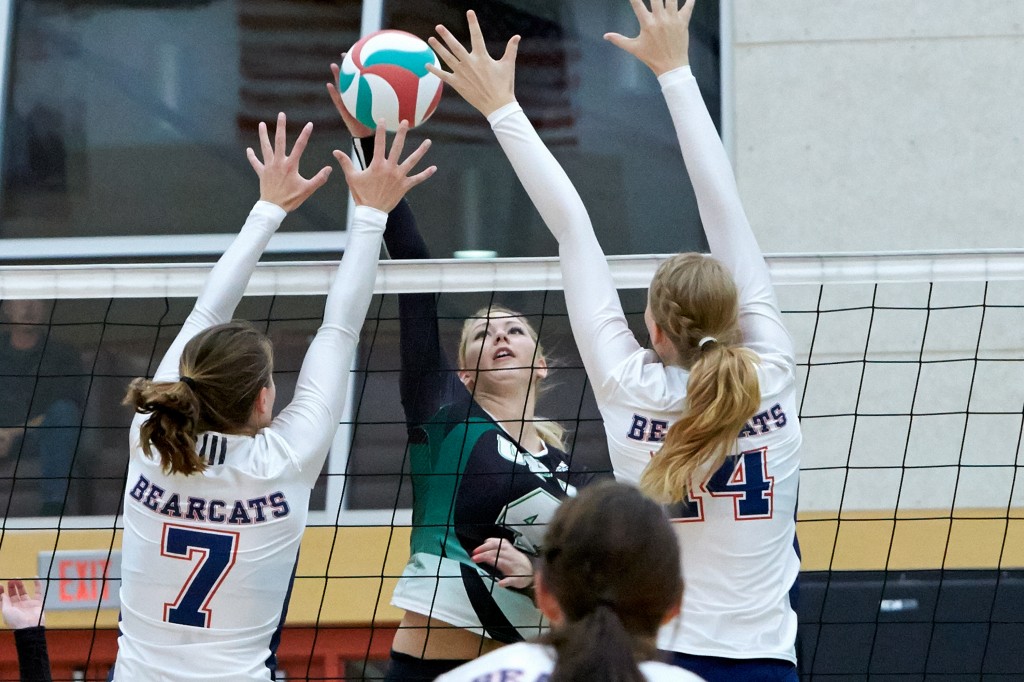 Monique Huber and the Cascades women's volleyball team clash with the Douglas Royals in their PacWest playoff opener. (Tree Frog Imaging photo)