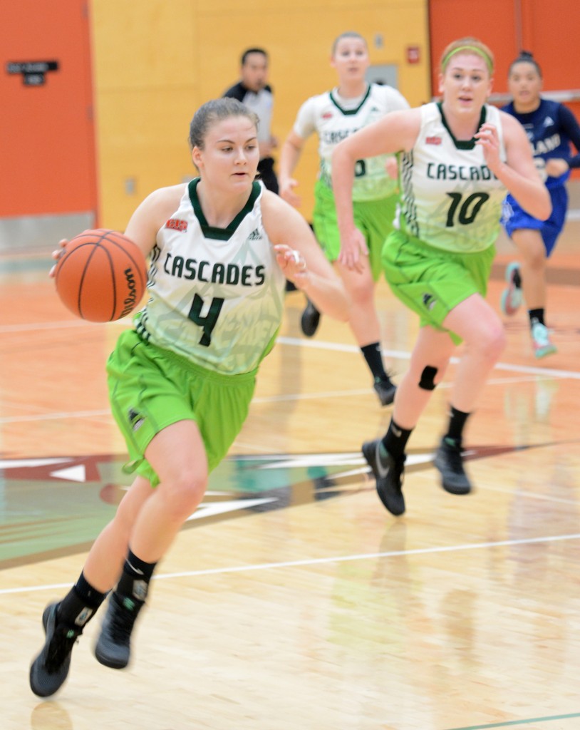 A pair of rookies, point guard Kate Head (4) and forward Taylor Claggett (10), have boosted the Cascades' fortunes this season.