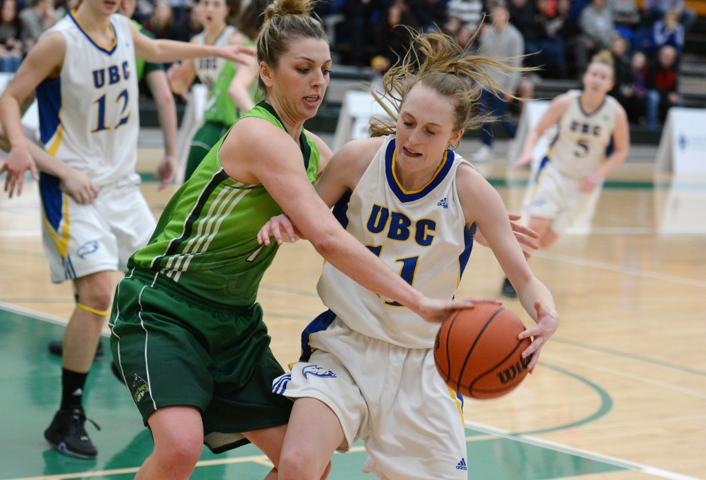 UFV's Kayli Sartori goes for the steal against UBC's Jessica Hanson.