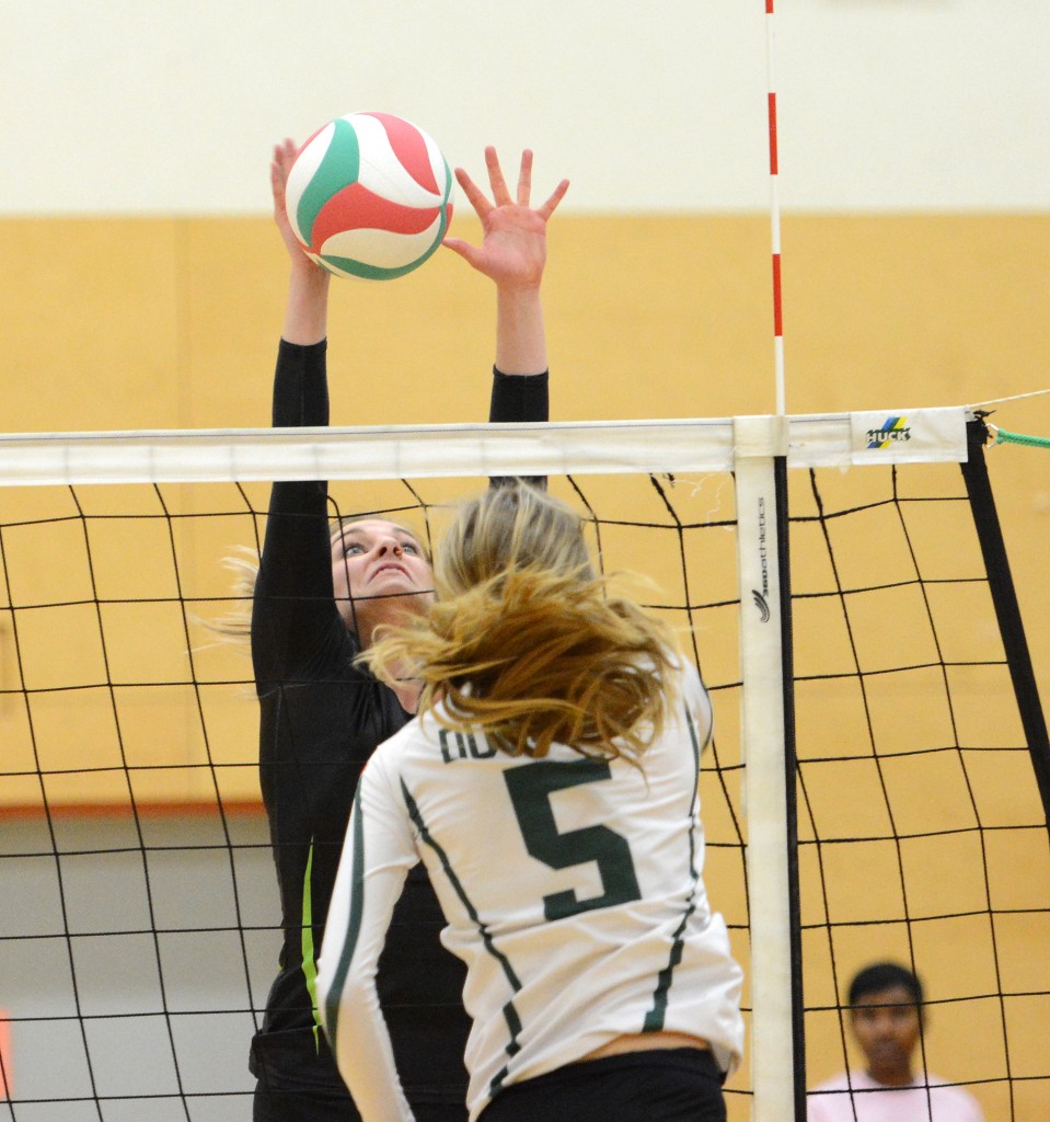 Kelly Robertson of the Cascades comes up with a big block.