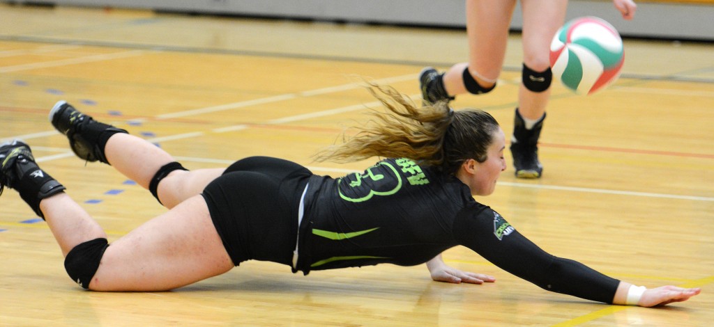 Libero Amy Davidson dives for a dig during Friday's loss to Douglas.