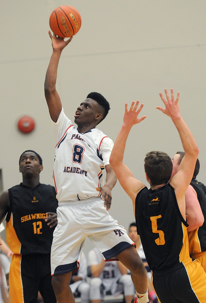 Pacific Academy's Daniel Adediran drives to the basket against Shawnigan Lake during the B.C. AA provincial basketball championships. (Evan Seal / Surrey Leader photo)