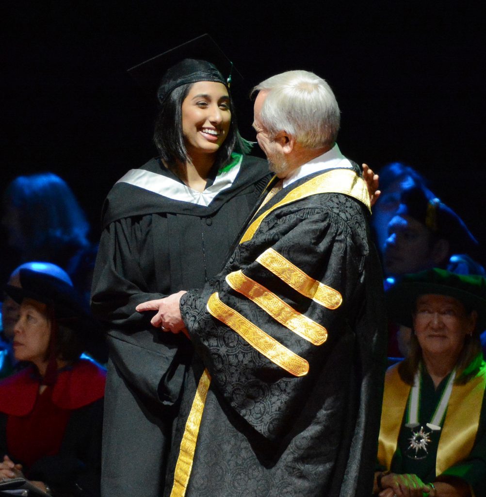 Cascades women's basketball alum Jaslyen Singh shared a moment with UFV president Dr. Mark Evered during Friday morning's convocation ceremony.