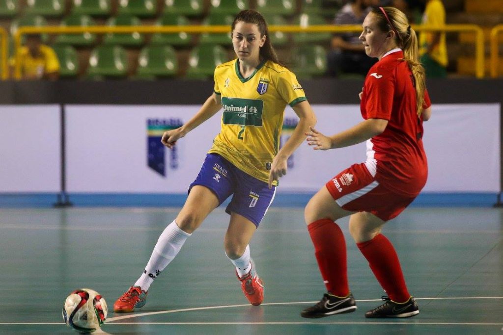 Shelby Beck (right) defends against a Brazilian attacker during World University Futsal Championship action on Monday. (FotoJump / wucfutsal2016.com)