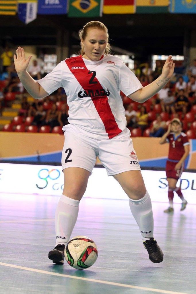 UFV's Shelby Beck chases down a loose ball during Saturday's semifinal vs. Russia. (FotoJump / wucfutsal2016.com)