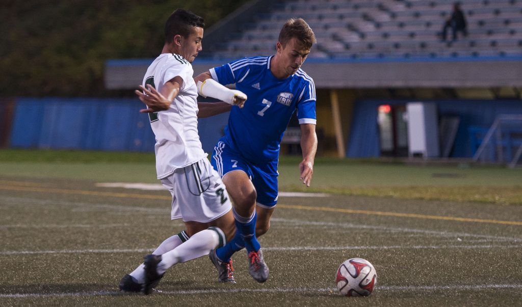 Cascades rookie defender Ryan Donald tangles with UBC's Titouan Chopin on Saturday. (Photo courtesy Rich Lam / UBC Thunderbirds)