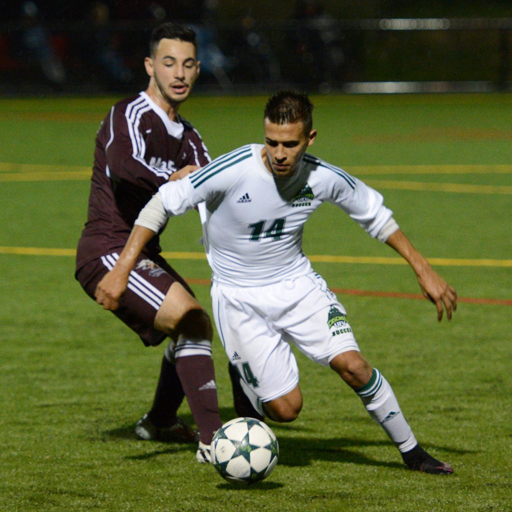 Connor MacMillan eludes a MacEwan defender.