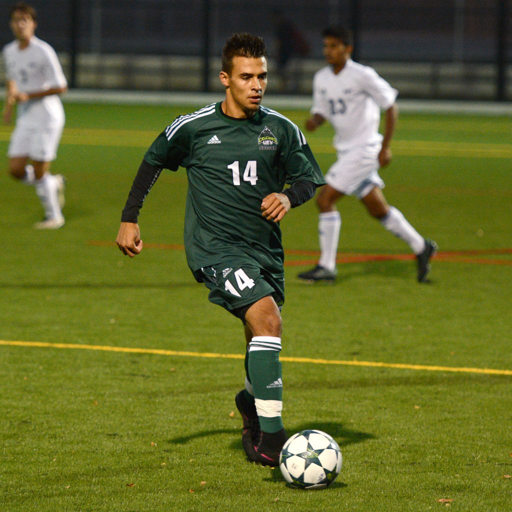 UFV's Connor MacMillan pushes the ball up the pitch.