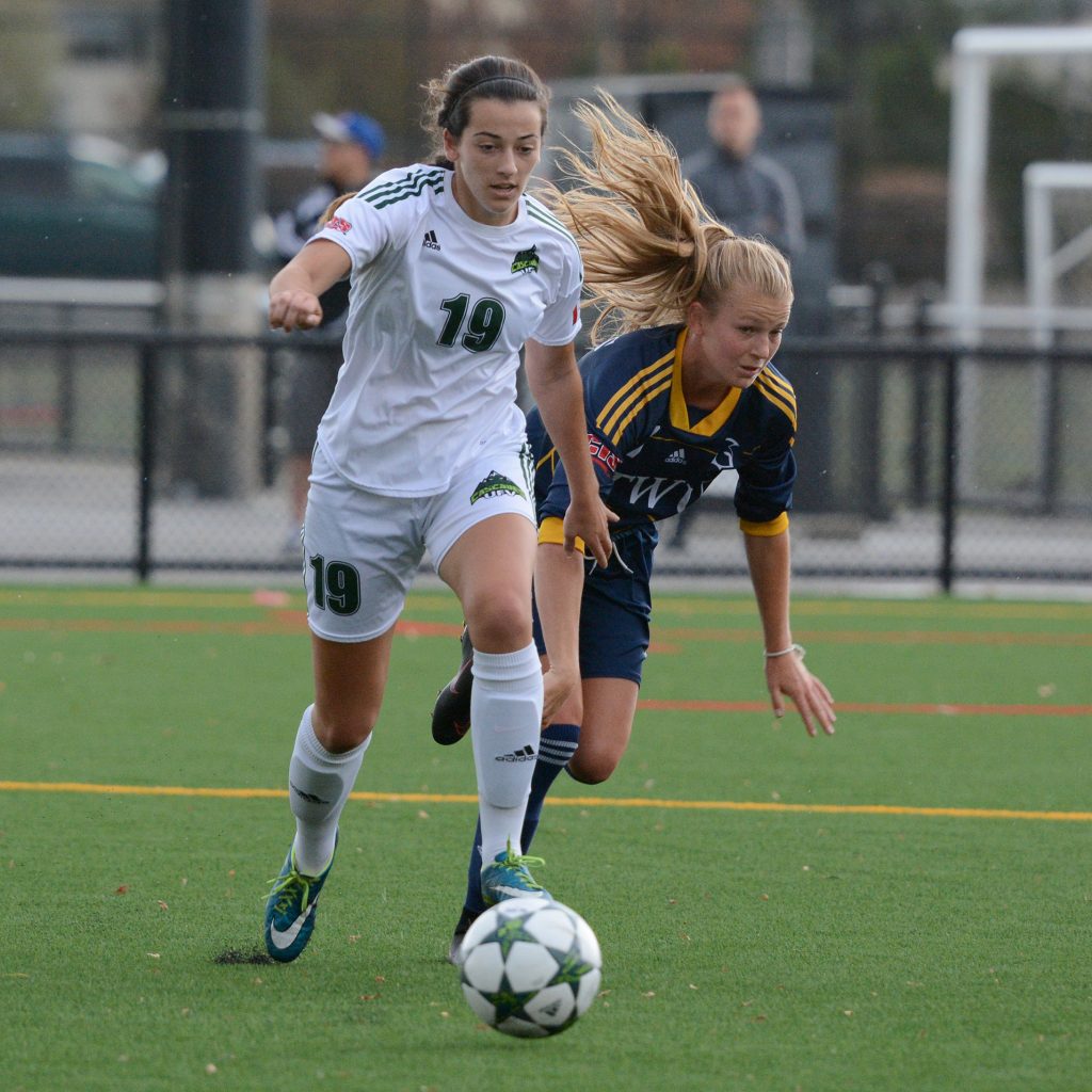 UFV's Brittney Zacharuk eludes a Trinity Western defender.