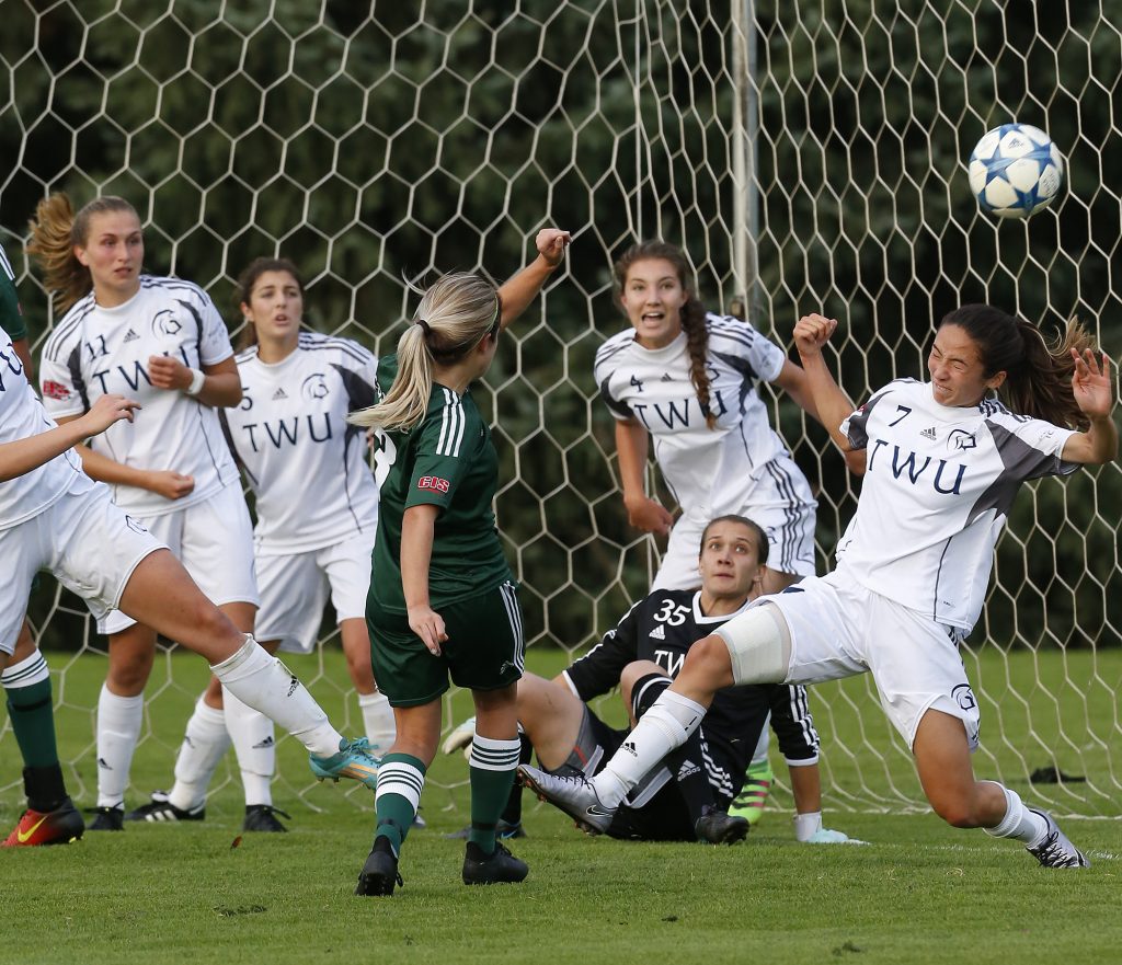 Danica Kump fires a rising shot over a series of TWU Spartans defenders in the 43rd minute. (Scott Stewart / TWU Spartans photo)