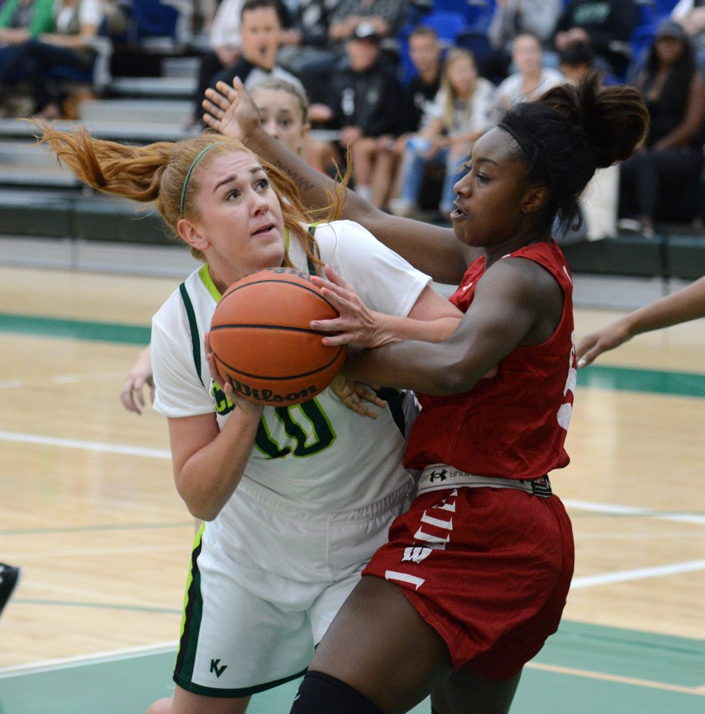 Taylor Claggett of the Cascades had eight points and 12 boards against the Carleton Ravens on Friday.