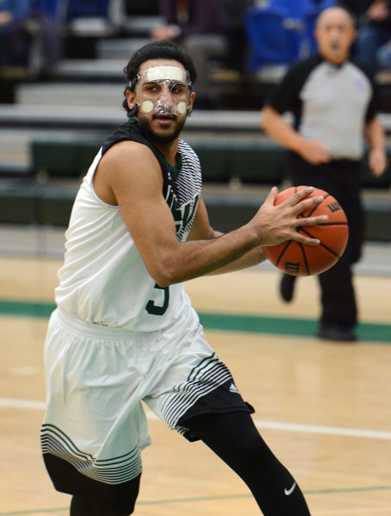 Seven of Vijay Dhillon's game-high 21 points came in the last three minutes of regulation.