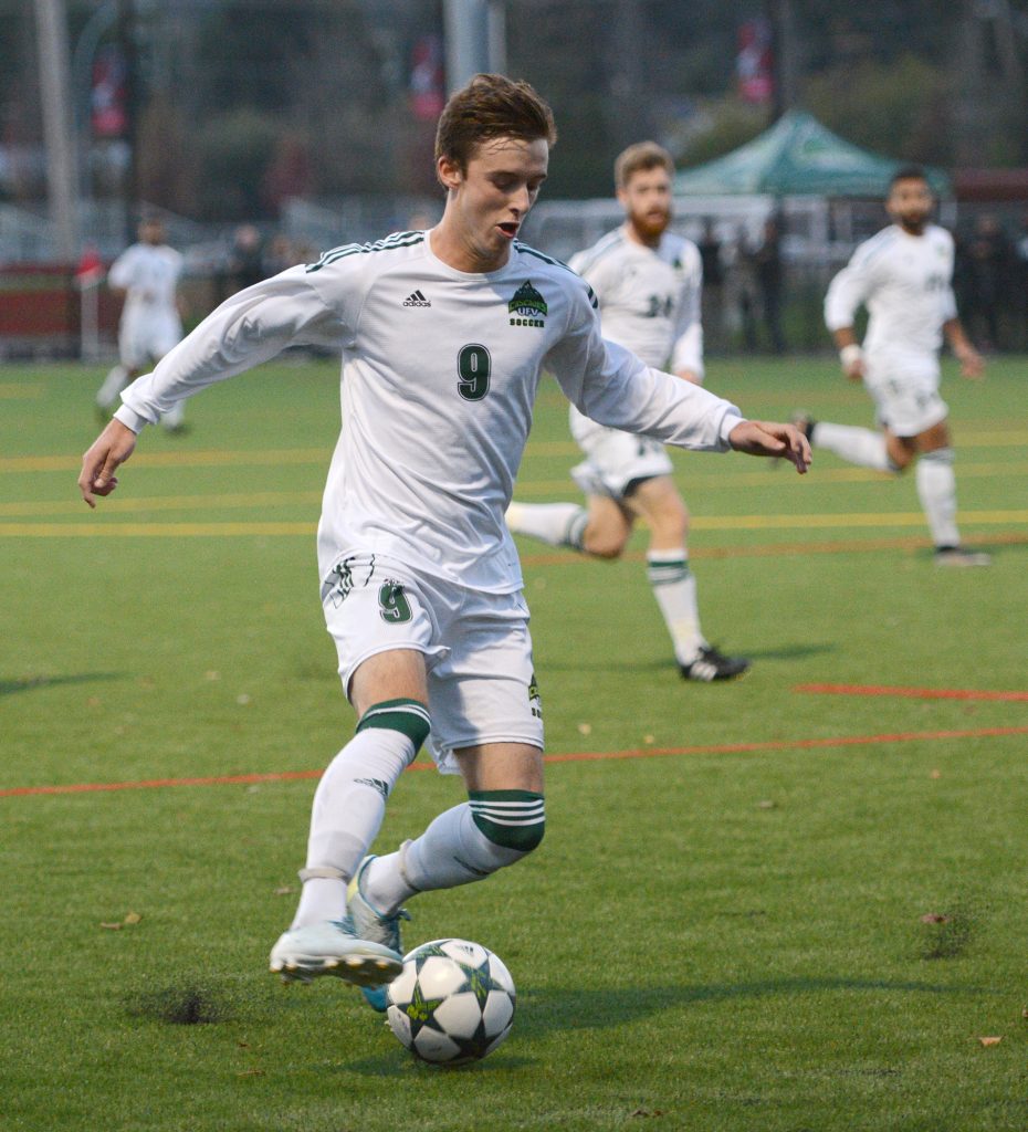 UFV's Daniel Davidson controls a pass against Trinity Western.