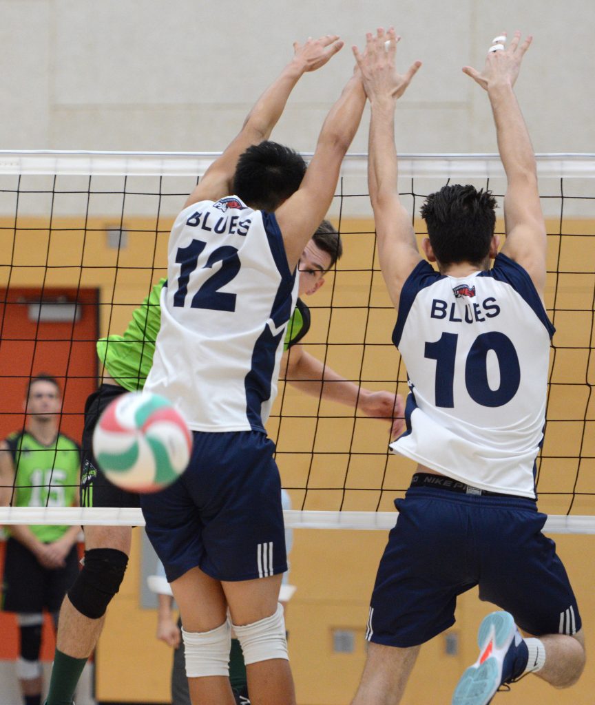 Joel Kleingeltink hammers down the final point of the match on Saturday vs. Capilano.