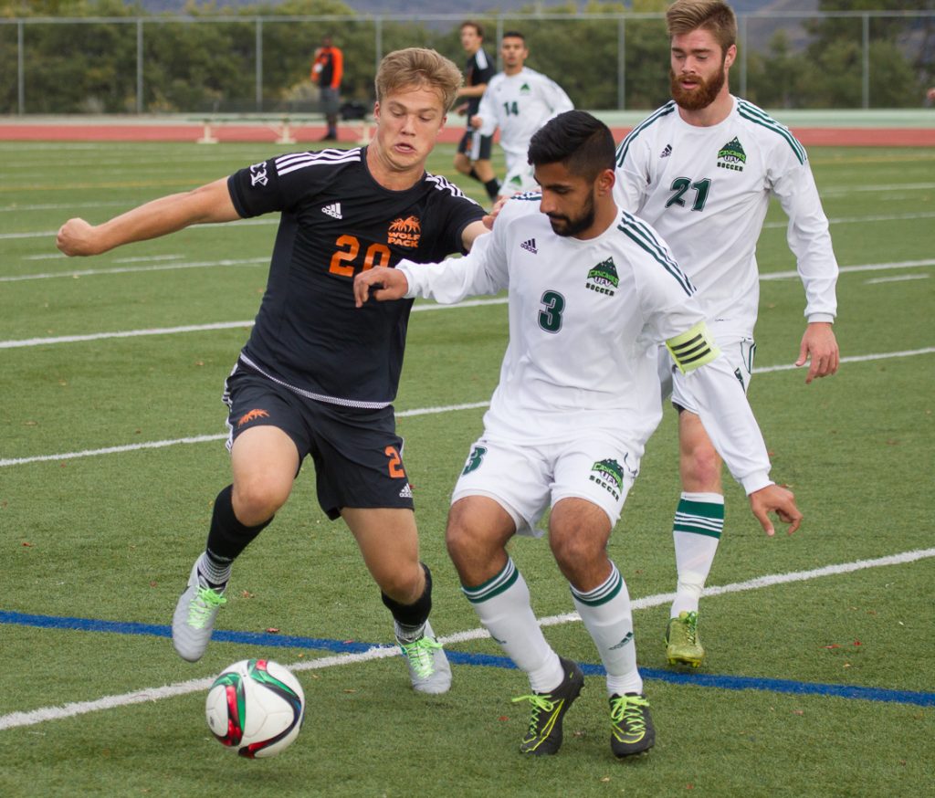 Cascades defender Sukh Dhaliwal clears the ball out of harm's way.