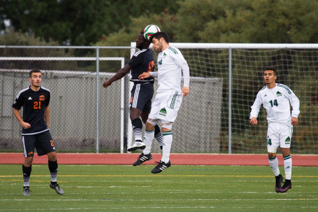 UFV's Michael Mobilio goes up for a header against TRU on Sunday. (Andrew Snucins / TRU Athletics)