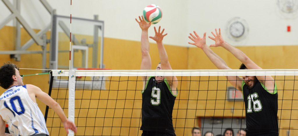 UFV's Adam Frederickson and Dayton Pagliericci go up for a block against Camosun on Saturday.