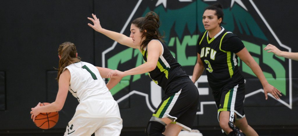 UFV's Jessica Zawada and Shayna Litman give some defensive attention to Sask's Libby Epoch.