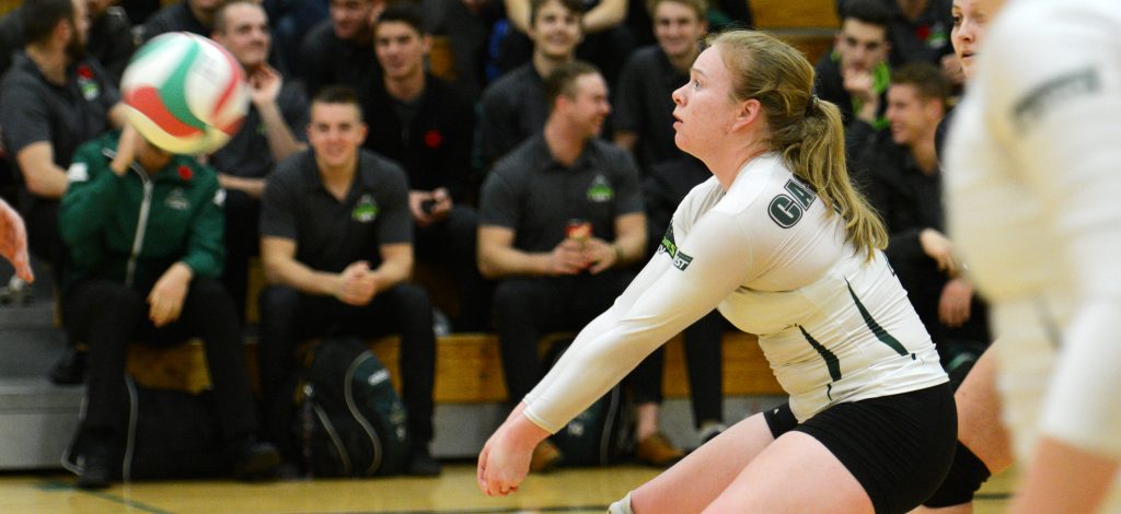 Rachel Funk lines up an incoming serve during Friday's PACWEST league game vs. Douglas.